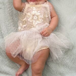 Elegant Cream Baby Dress with Floral Design